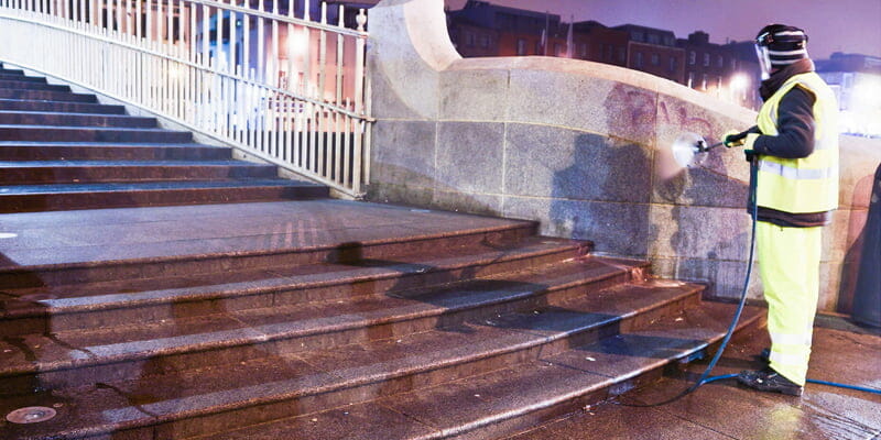 Removing graffiti from Hapenny Bridge P Mac