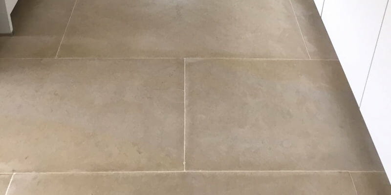 Limestone floor repaired and polished