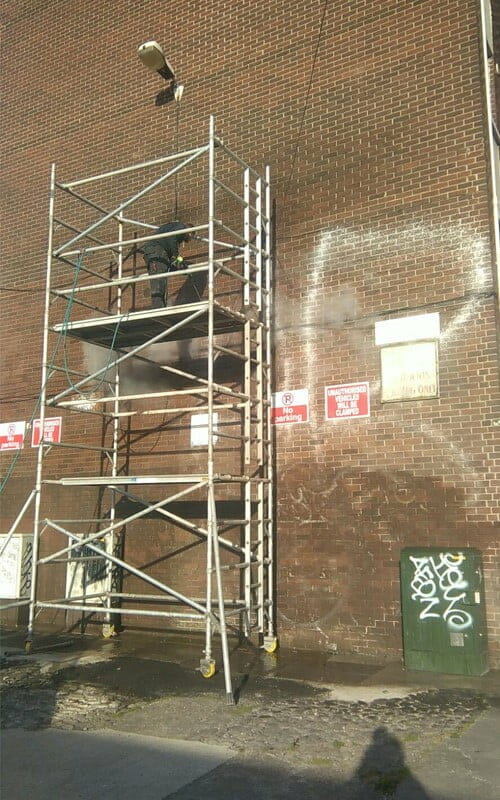Safely removing graffiti from Tom Kelly flats Dublin