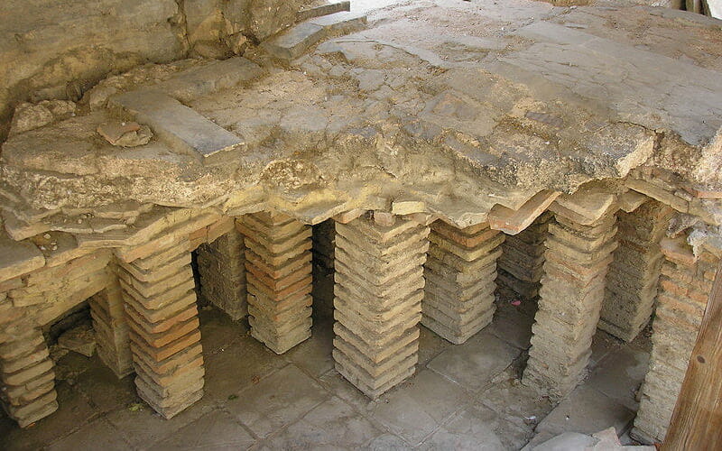 Hypocaust system early underfloor heating Arles Thermes de Constantin France