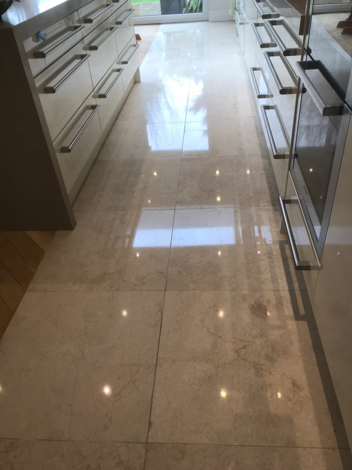Natural Stone floor cleaned and polished by PMAC floor team
