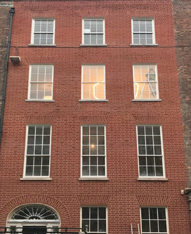 After photo of Georgian building