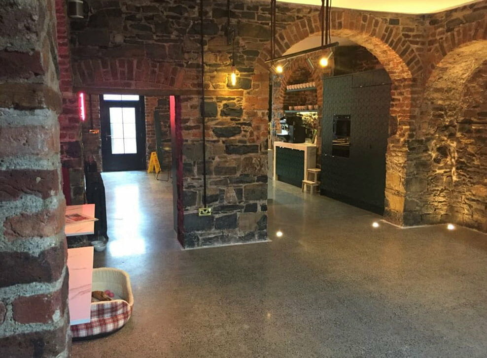 Restoration of 19th century brick and limes stone walls by PMAC