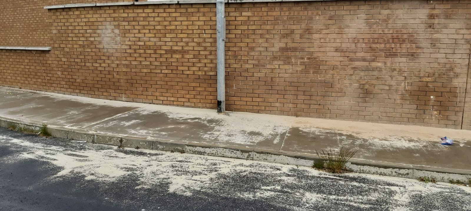 Wall sandblasted by contractor