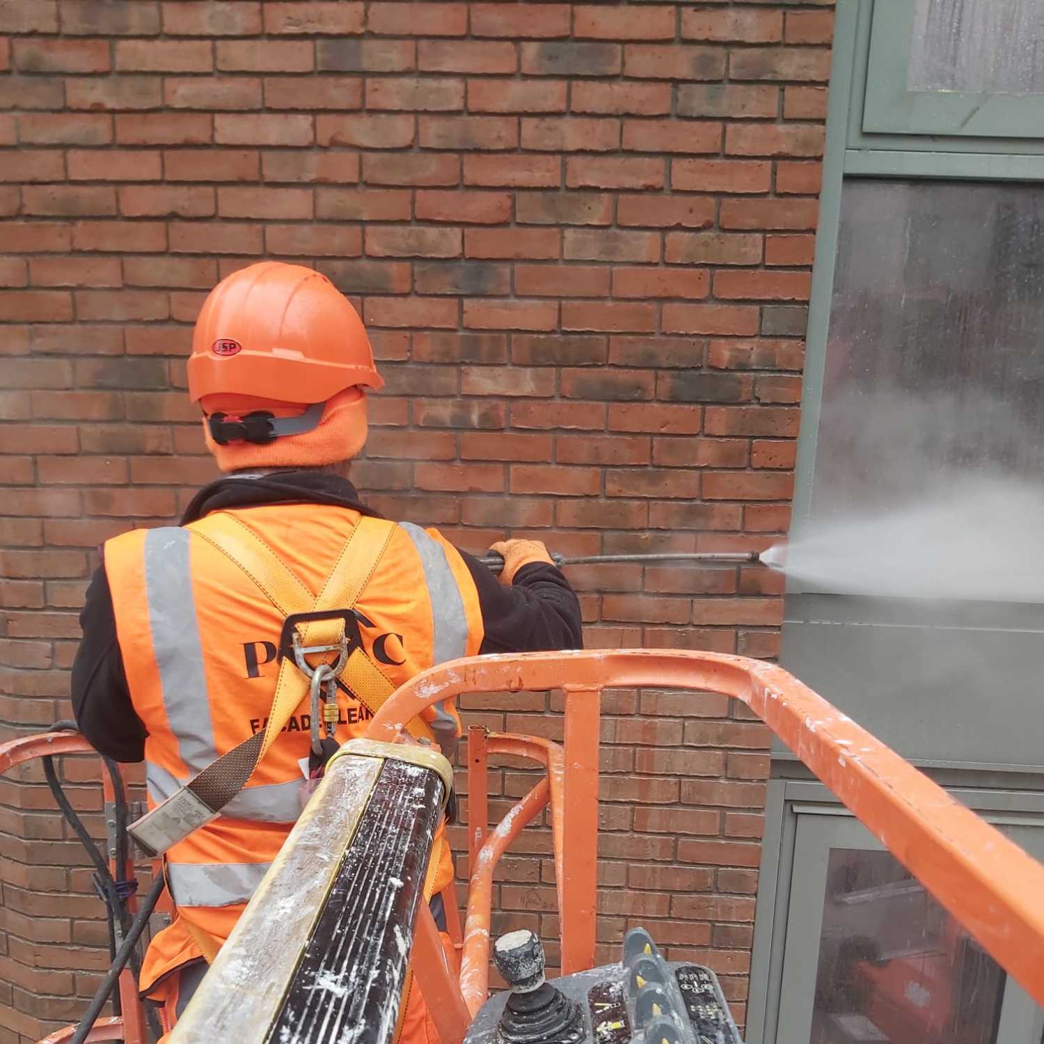Brick facade cleaning