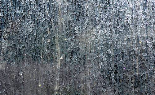 window-hard-water-stains-removal-minnesota Mineral deposits on glass
