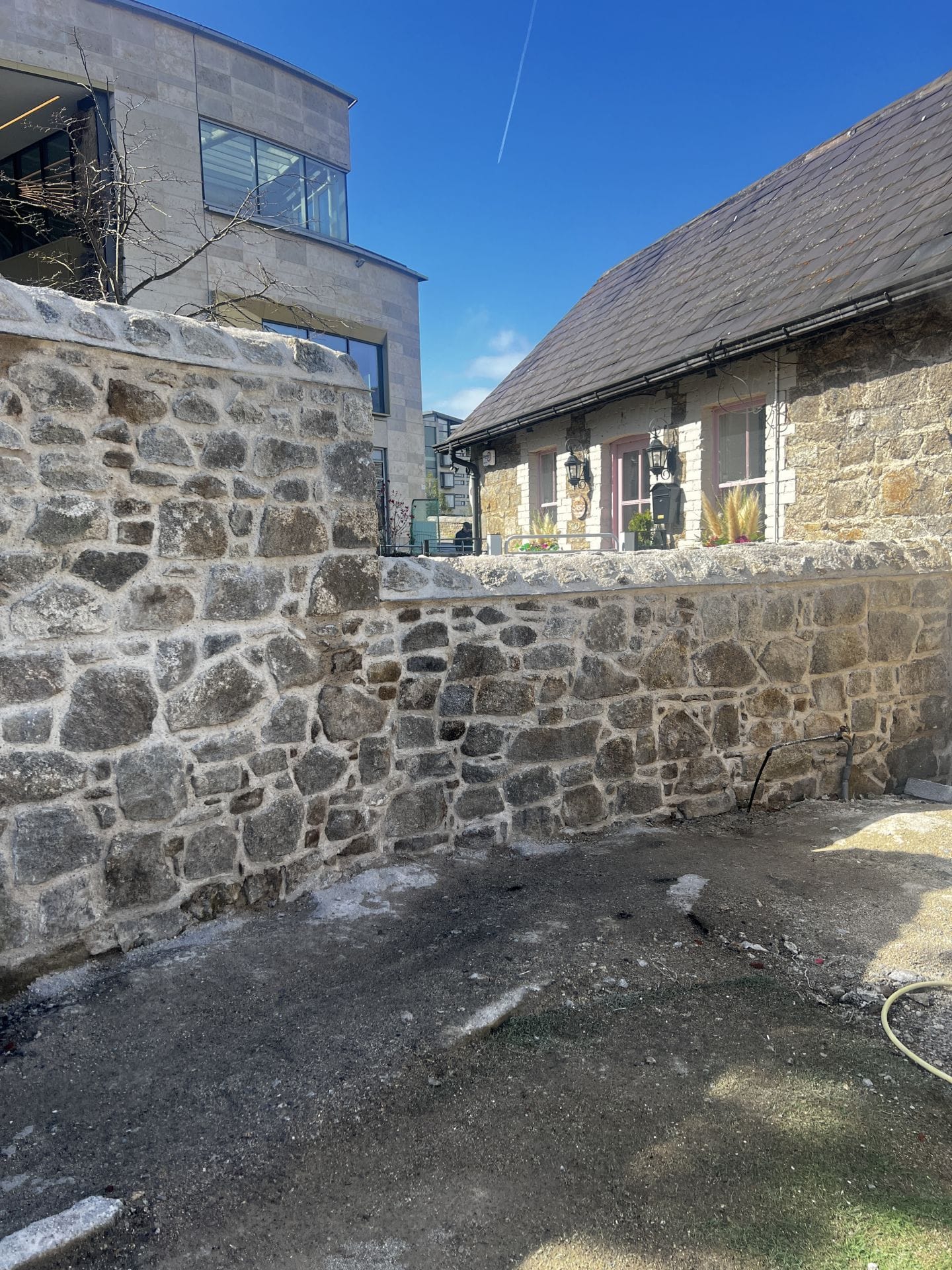 Wall A, fully rebuilt and repointed using traditional methods. Wall A, fully rebuilt and repointed using traditional methods.