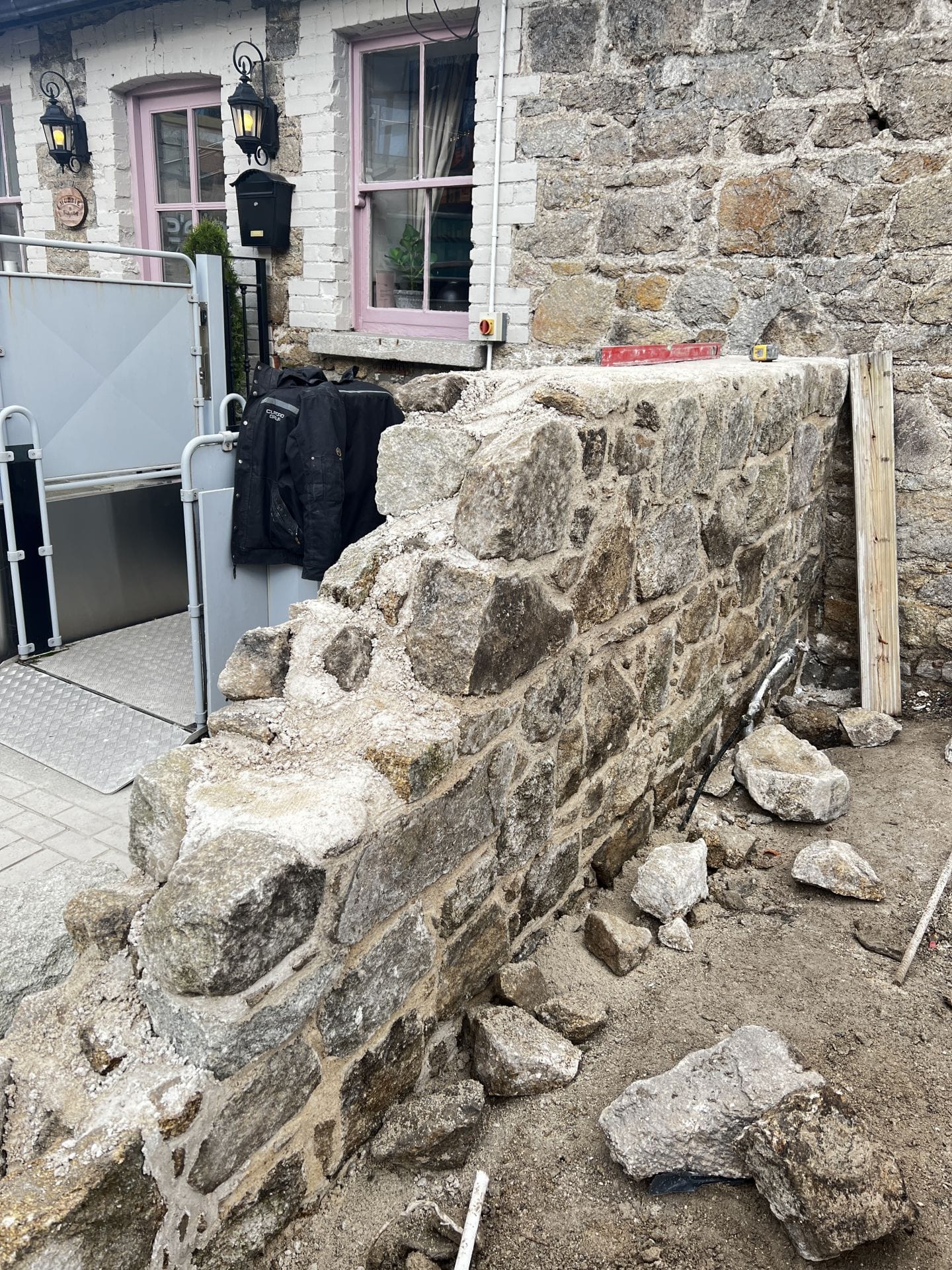 Wall A required full rebuild and repointing Wall A required full rebuild and repointing