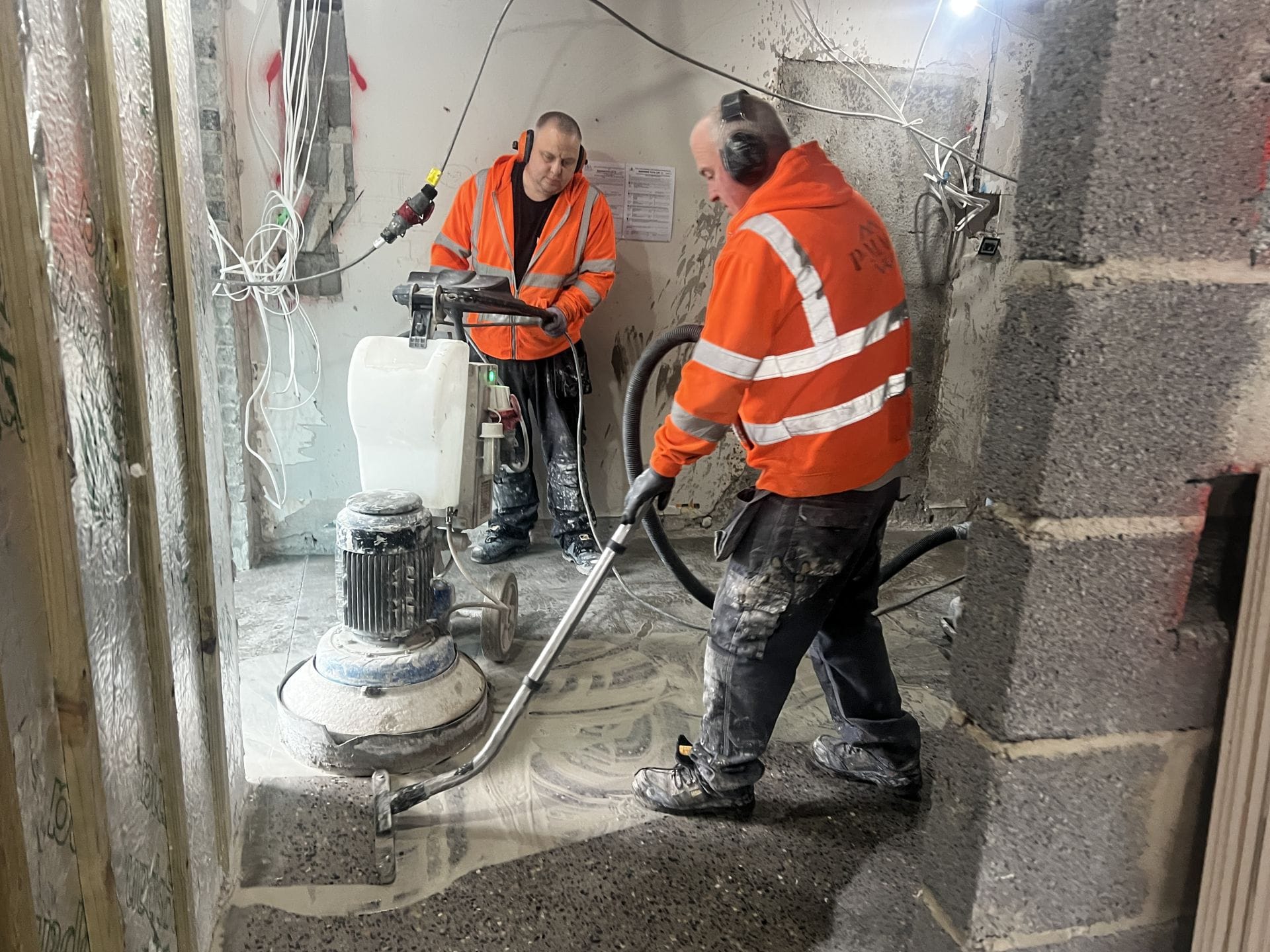 PMAC operatives applying grind to create platinum finish polished concrete floor