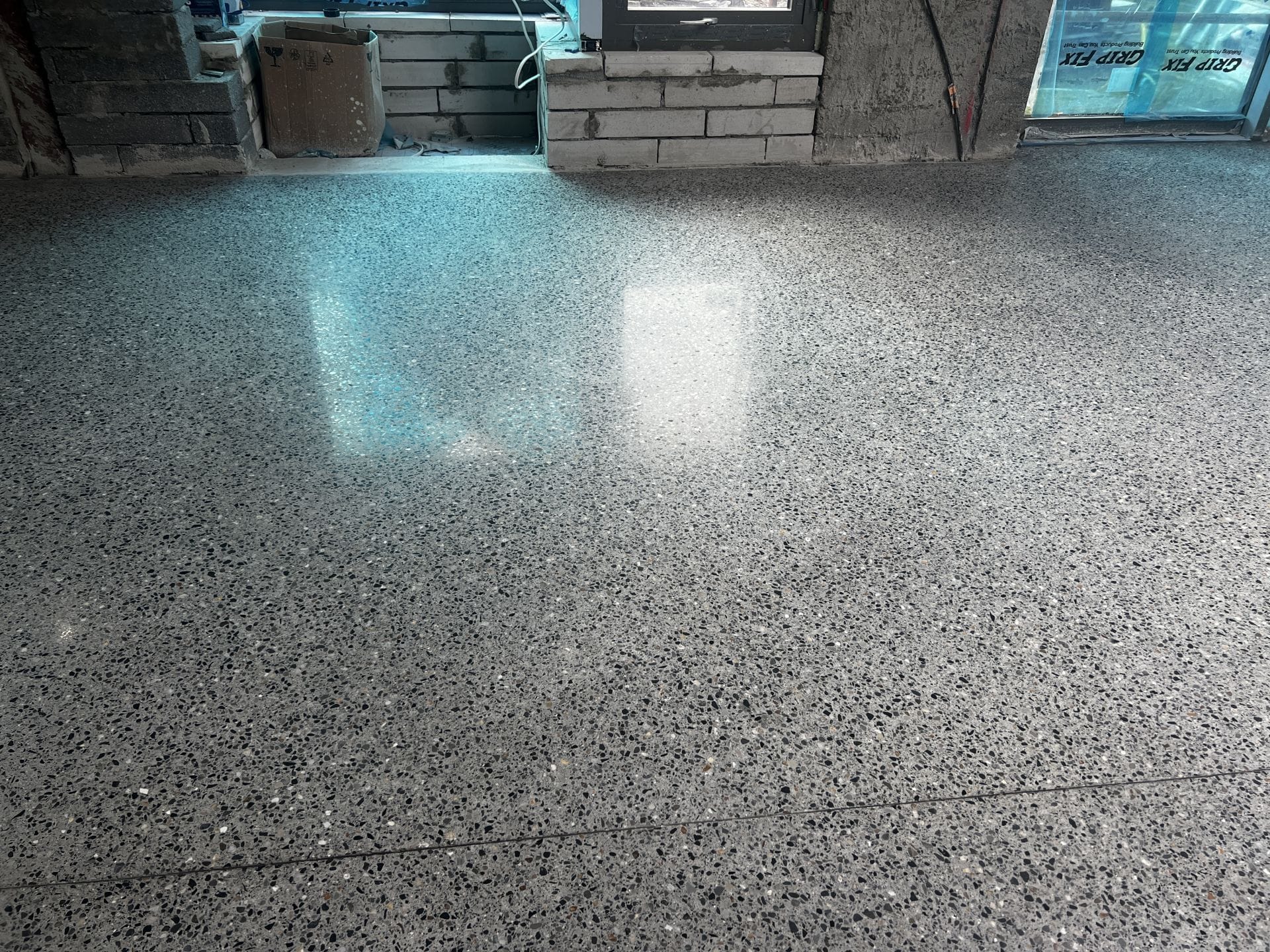 Residential platinum finish polished concrete floor by PMAC