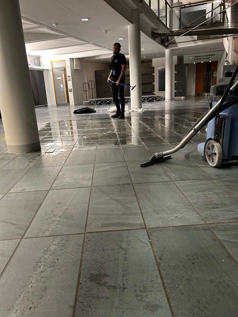 PMAC operator cleaning a commercial floor